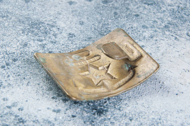 istock Old brass belt buckle with a star 1206333262