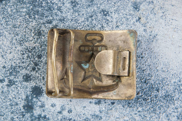 istock Old brass belt buckle with a star 1206333280