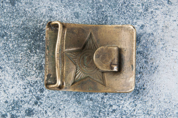 istock Old brass belt buckle with a star 1206333382