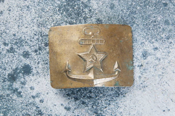 istock Old brass belt buckle with a star 1206333933