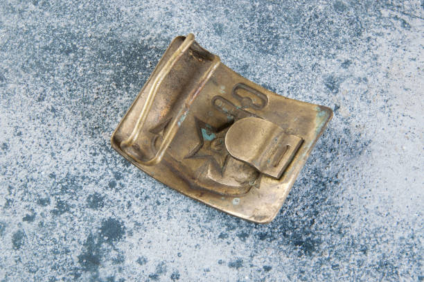 istock Old brass belt buckle with a star 1206333943