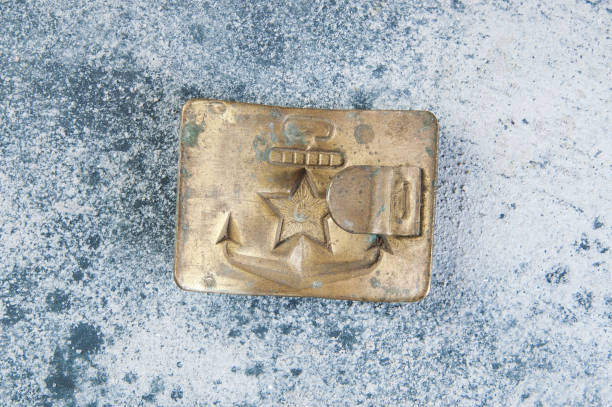 istock Old brass belt buckle with a star 1206333954