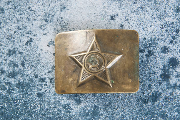 istock Old brass belt buckle with a star 1206334093