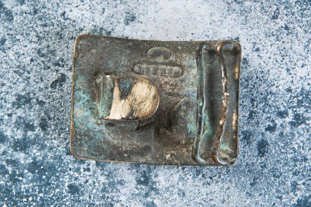 istock Old brass belt buckle with a star 1206334140
