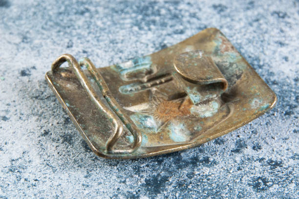 istock Old brass belt buckle with a star 1206334218