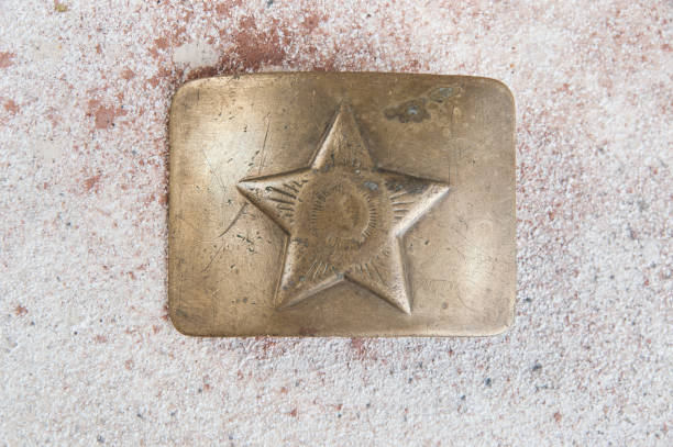 istock Old brass belt buckle with a star 1206334548