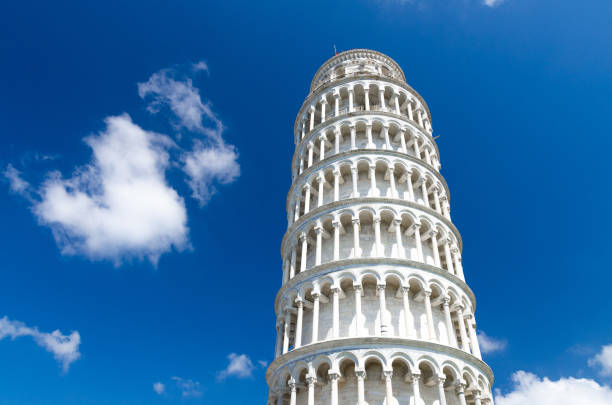 istock Leaning Tower Torre di Pisa on Piazza del Miracoli square, blue sky with white clouds background in beautyful sunny day, view from below close-up isolated copy space, Tuscany, Italy 1206334658
