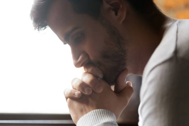 istock Close up of pensive male thinking of personal problems 1206334668