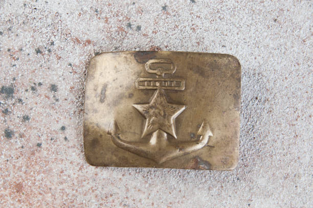 istock Old brass belt buckle with a star 1206335457