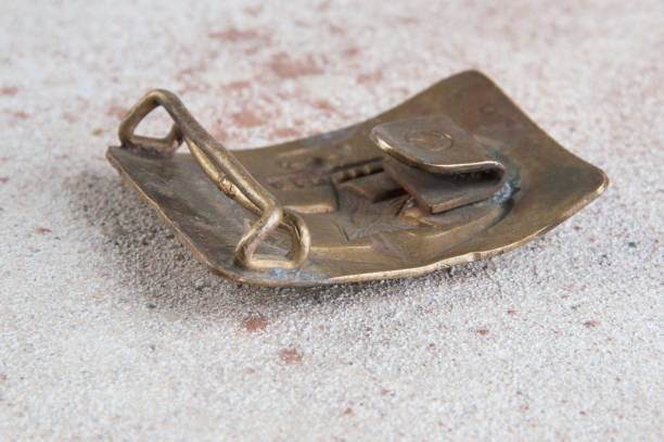 istock Old brass belt buckle with a star 1206335729