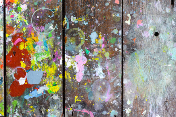 istock Wooden boards covered in paint creating random and abstract artistic patterns and shapes for creative background 1206339374