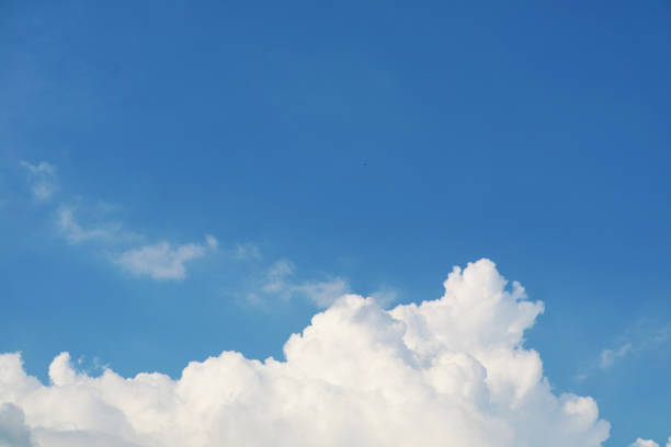 istock pure and clear blue sky white cloud and sunlight shiny on a day 1206341956
