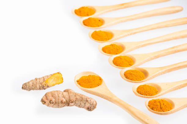 istock Fresh organic root and turmeric powder - Curcuma longa 1206344418