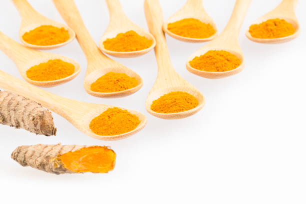 istock Fresh organic root and turmeric powder - Curcuma longa 1206345875