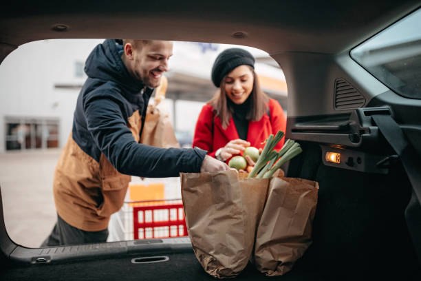istock Young couple in groceries shopping 1206354551