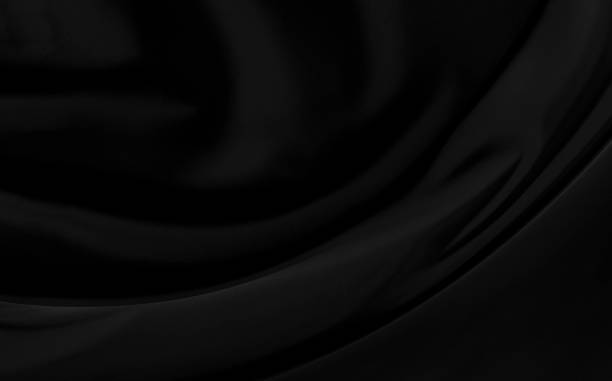 istock Black gray satin dark fabric texture luxurious shiny that is abstract silk cloth background with patterns soft waves blur beautiful. 1206354570
