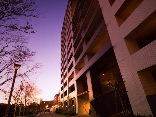 istock High-rise apartment building at sunset 1206355398