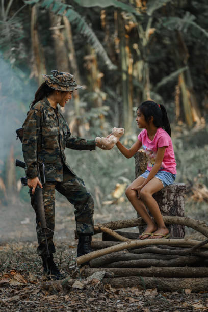 istock Soldier relationship with children 1206358928