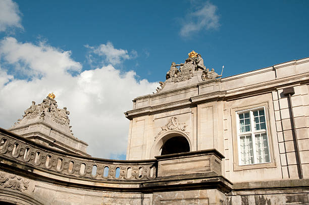 istock gold crowns on royal palace 120636111
