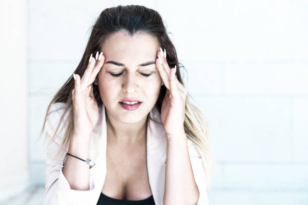 istock Upset beautiful lady suffering from headache 1206362956