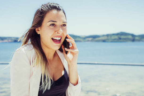 istock Joyful surprised lady excited with phone call 1206363221