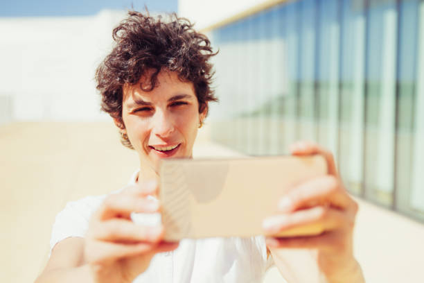 istock Content woman using smartphone outdoor 1206365429