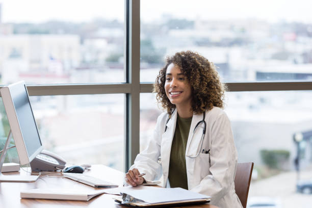istock Confident female doctor working in her office 1206365677