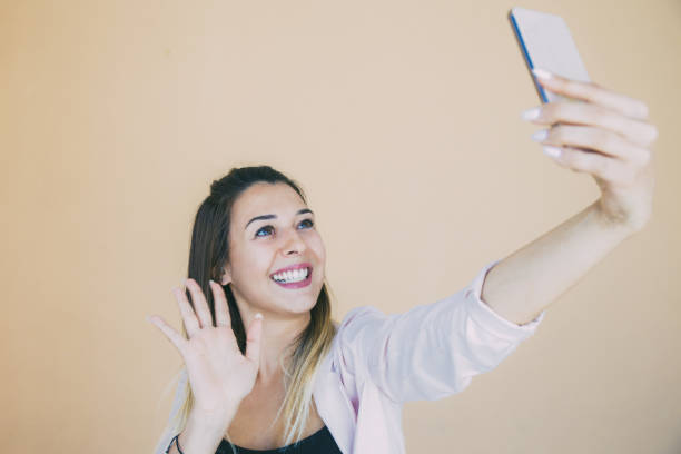 istock Happy joyful lady posing for selfie 1206365702
