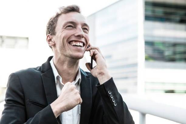 istock Happy joyful business man celebrating success 1206366563