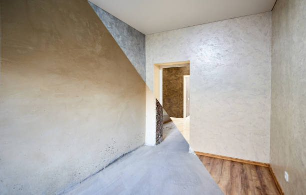 istock Room in apartment before and after renovation works 1206374247