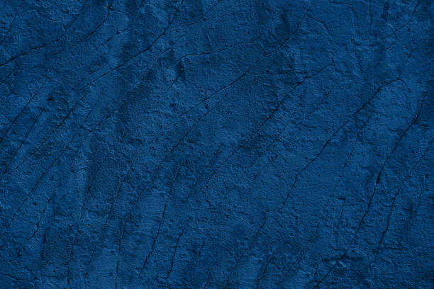 istock blue shabby stucco background with cracks 1206375180