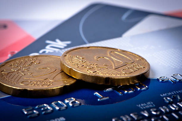 istock Credit cards and coins macro. 120637526