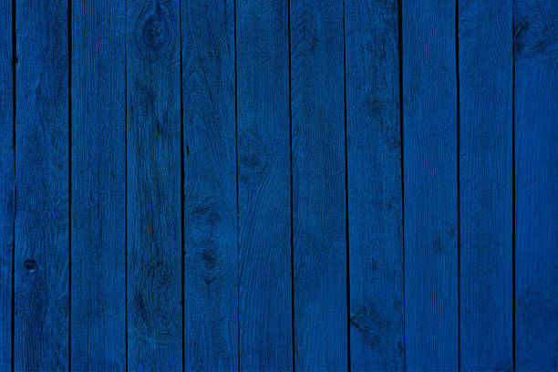 istock blue fence painted wooden plank panel background 1206375347