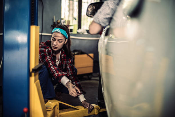 istock Beautiful woman mechanic 1206380031