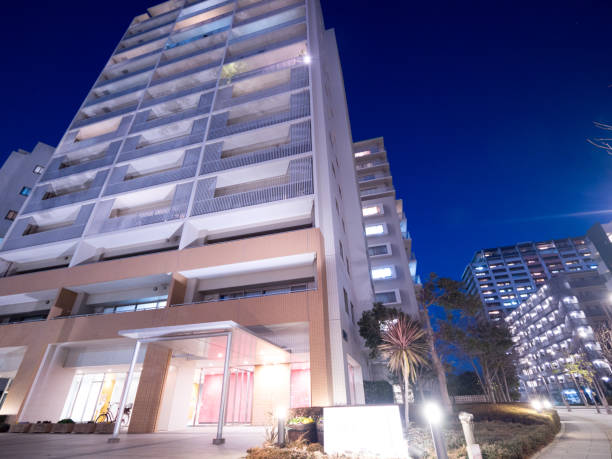 istock High-rise apartment building at sunset 1206380077