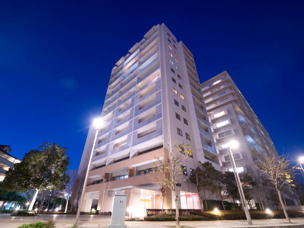 istock High-rise apartment building at sunset 1206380117