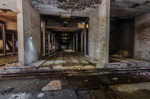 istock concrete halls in old factory 1206382803