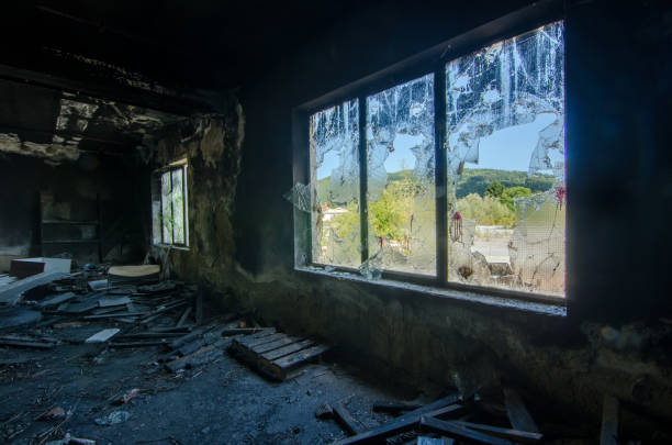 istock Broken window of a factory 1206382834