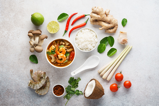 Tom Yum Goong or Tom Yam Kung and set of ingredients for cooking. Traditional Thai spicy shrimp soup with coconut milk. Flat lay.
