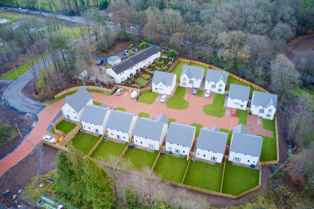 istock Suburban house development aerial view with countryside views uk 1206384792