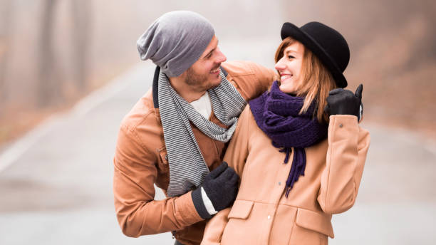 istock Couple enjoying outdoors in cold autumn / winter time. 1206390160