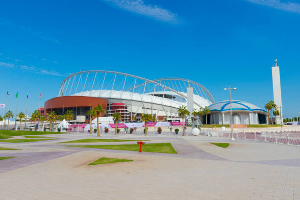 Khalifa National Stadium against blue sky in Doha, Qatar Doha, Qatar - November 24, 2019 : Entrance of Khalifa National Stadium against blue sky in Doha, Qatar on November 24, 2019. khalifa stock pictures, royalty-free photos & images