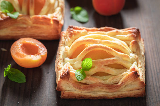 istock Sweet puff pastry topped with powdered sugar 1206392523