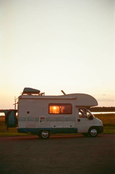 istock Scenic of camper van at sunset 1206392614