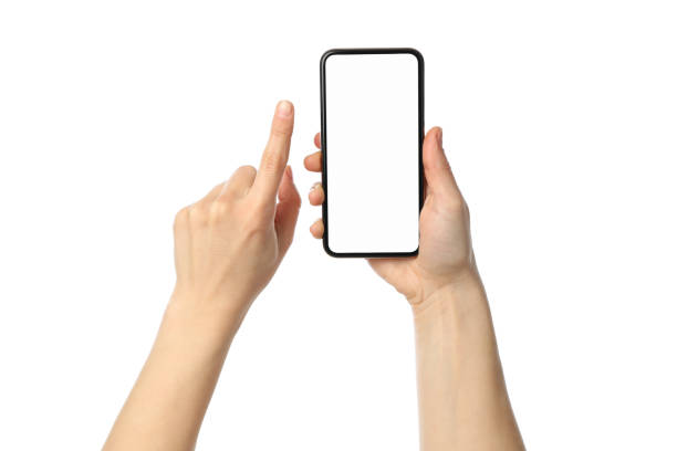 istock Female hands holding phone with empty screen, isolated on white background 1206394233