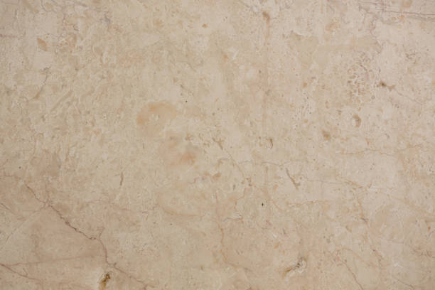 istock Fresh marble texture in beige hue close-up. 1206395252