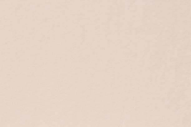 istock Paper texture light rough textured spotted blank copy space background in beige yellow. 1206395331