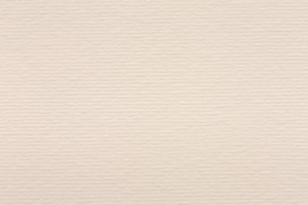 istock Natural light beige recycled paper background. High quality texture. 1206395389
