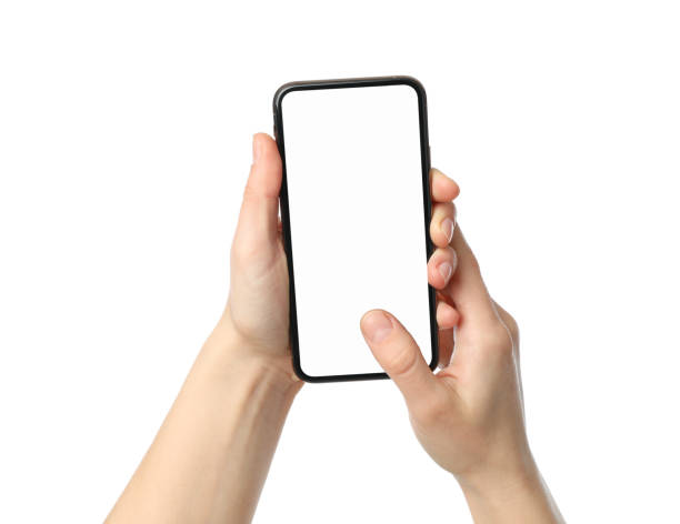 istock Female hands holding phone with empty screen, isolated on white background 1206395420