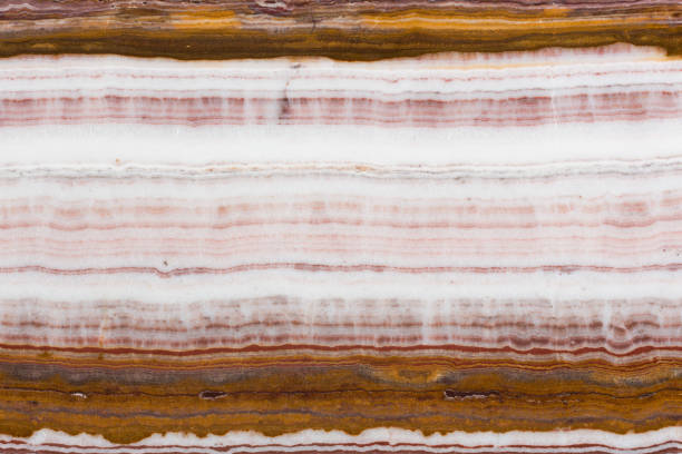 istock Red and brown onyx decorative stone texture. 1206395435